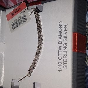 1/19 carat diamond bracelet in sterling silver.